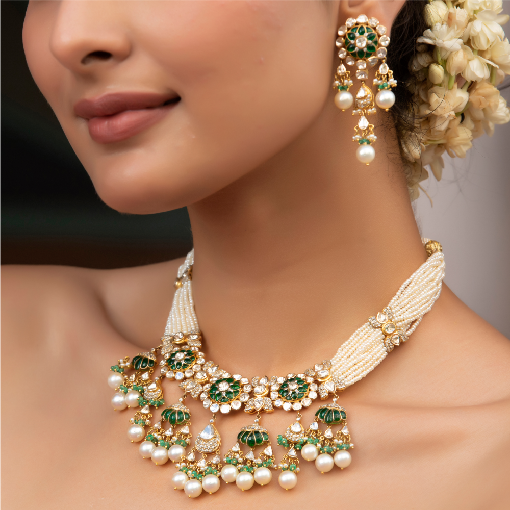 Classic Kundan charm meets emerald-toned beauty